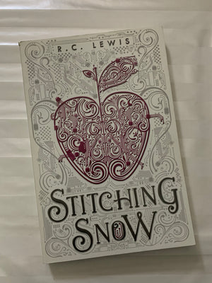 Stitching Snow- By R.C. Lewis